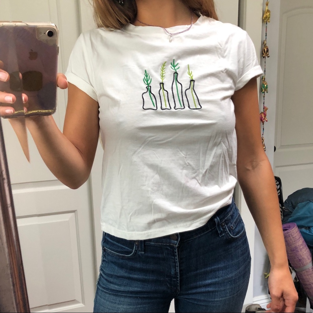 Sprouts on a T-shirt for an organic garden guru